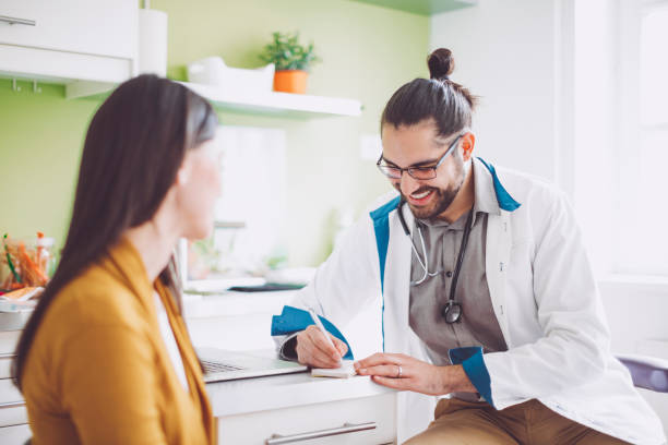 istock Doctor consulting his patient 962239782