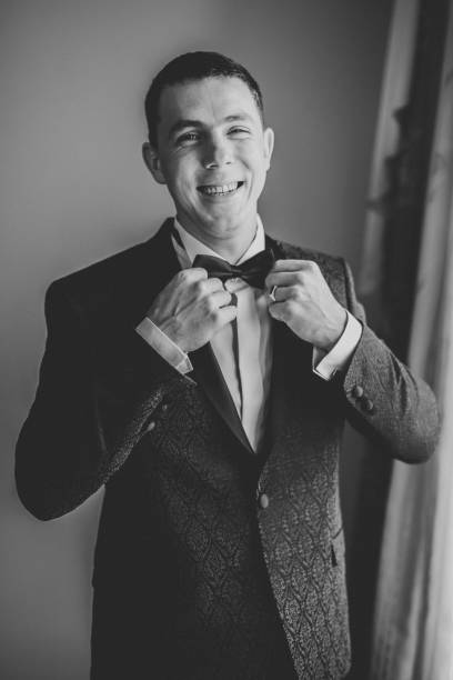 istock Beautiful man, groom posing and preparing for wedding 962246276