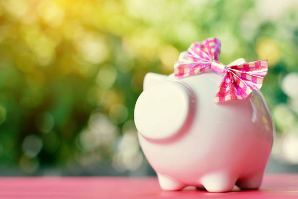 istock Close-Up Of Piggy Bank On Table 962248202