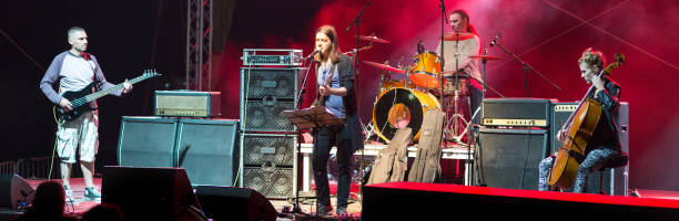 istock Rock band playing on the stage 962251062