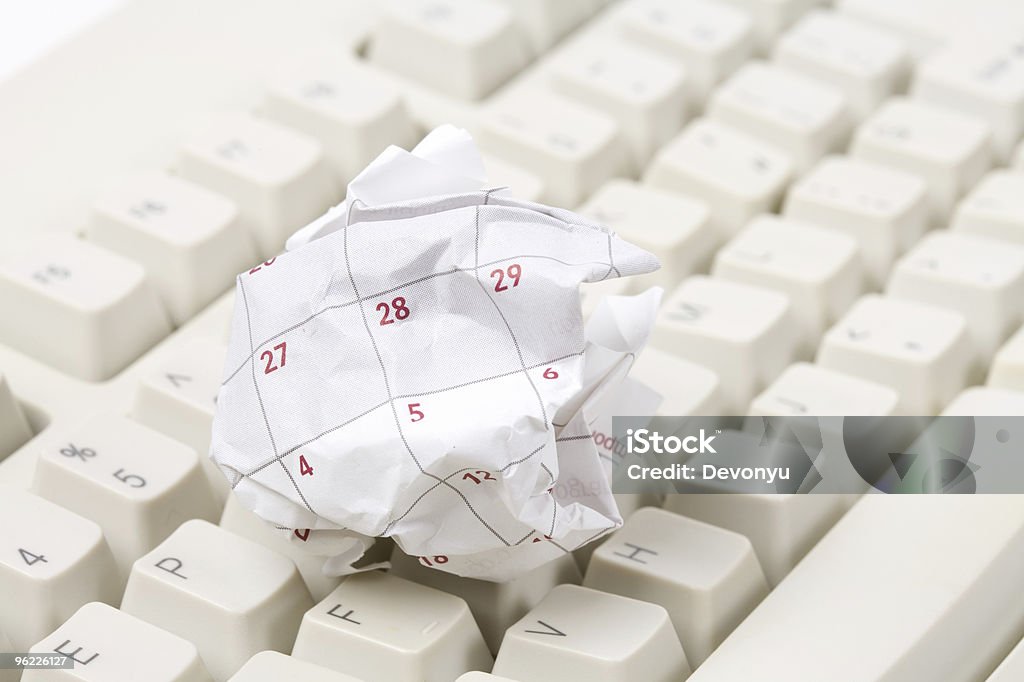 Calendar paper ball and computer keyboard  Business Stock Photo