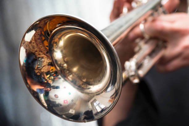 istock Trumpeter is playing on a silver trumpet 962263188