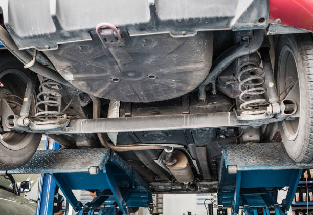 istock car on lifts in auto service centre for maintenance and tire replacement 962263786