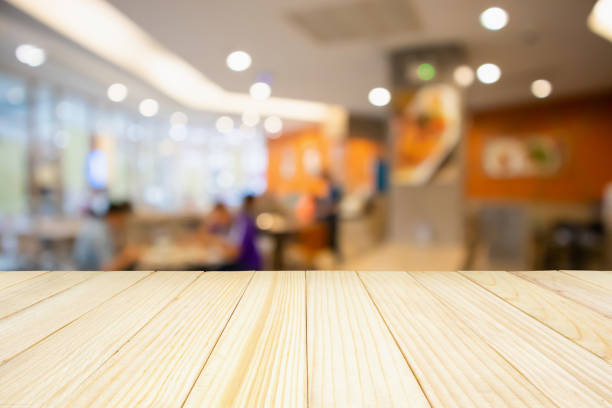 istock Restaurant cafe or coffee shop interior with people abstract defocused blur background 962263896