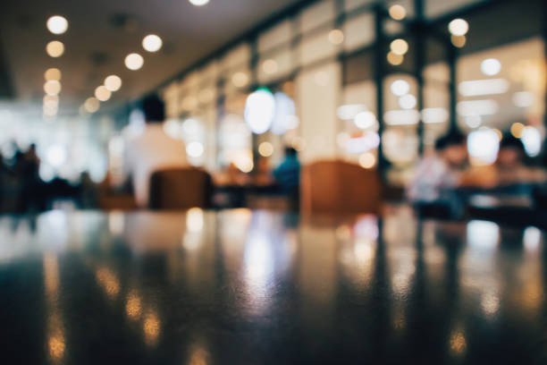 istock Restaurant cafe or coffee shop interior with people abstract defocused blur background 962263922