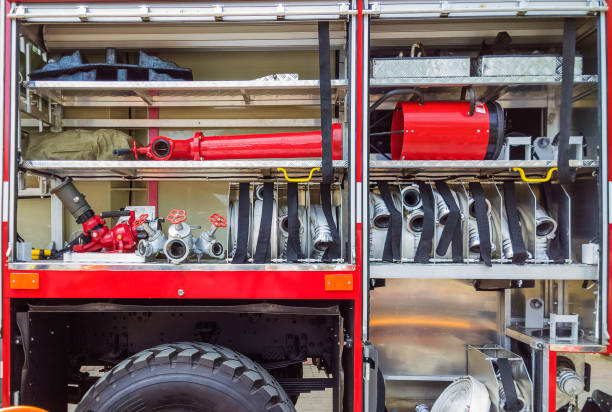 istock Part of fire truck with equipment storage doors open. 962264798