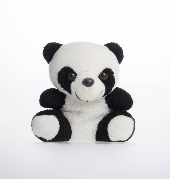 istock toy or panda soft toy on a background 962267556