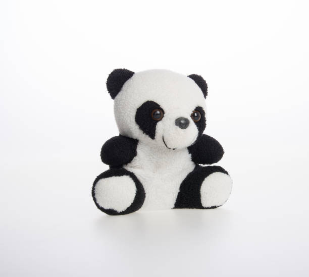 istock toy or panda soft toy on a background 962267576