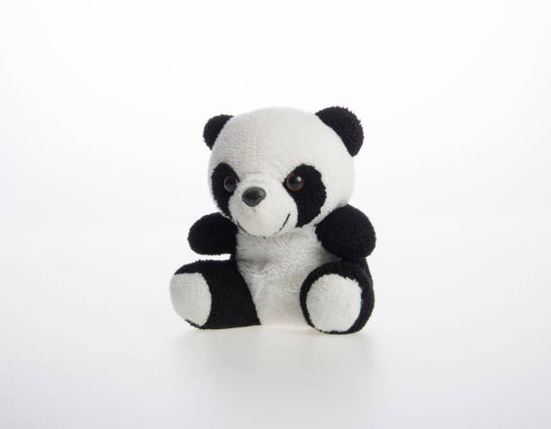 istock toy or panda soft toy on a background 962267582