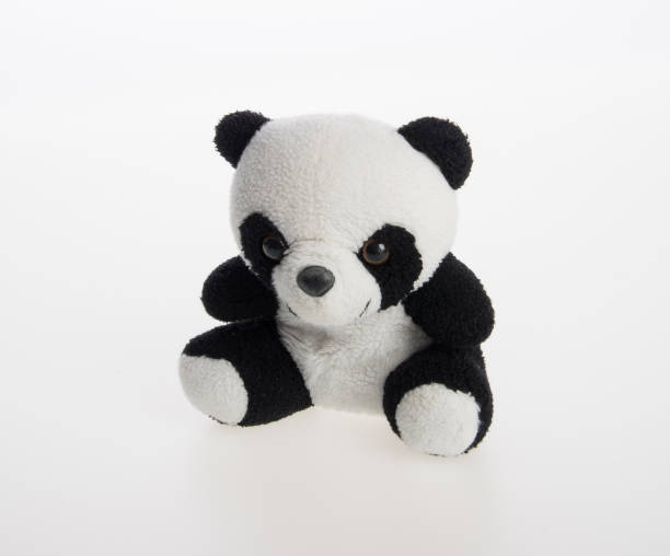 istock toy or panda soft toy on a background 962267588