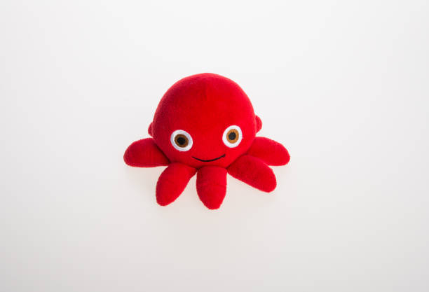 istock toy or octopus soft toy on the background 962267640