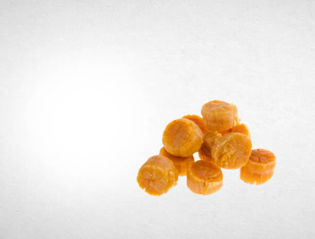 istock scallop or dried scallop on a background 962273948