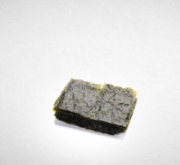 istock seaweed or dry seaweed on the background 962279382