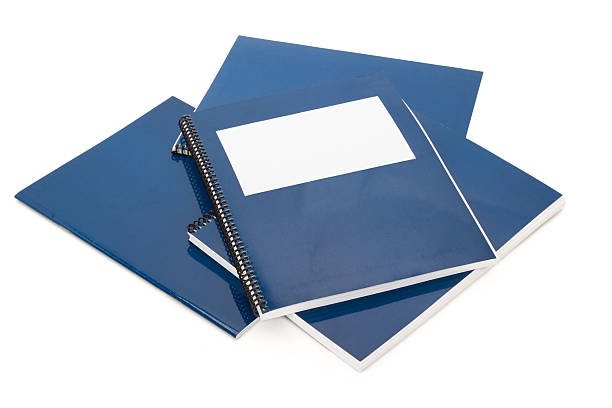 istock Pile of blue school textbooks on white background 96228136