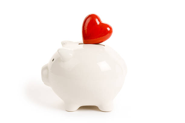 Pink piggy bank on white. Horizontal composition.