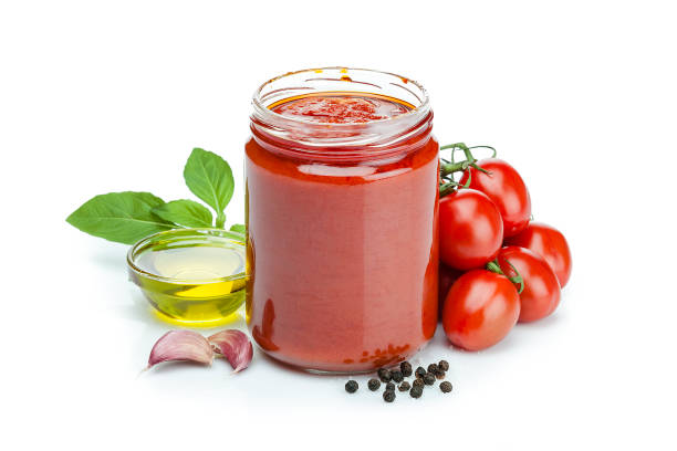 istock Tomato sauce jar isolated on white background 962284916