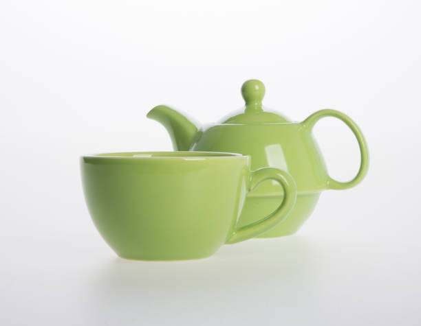 istock Tea pot set or Porcelain tea pot and cup on background 962309988