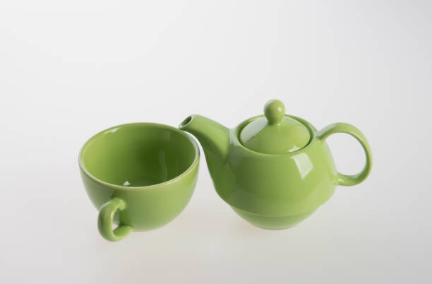 istock Tea pot set or Porcelain tea pot and cup on background 962309990