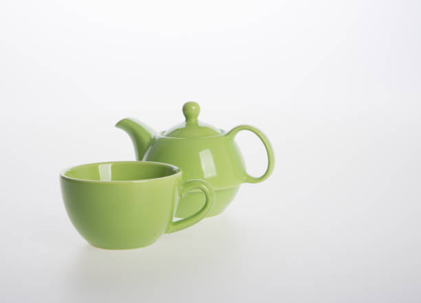 istock Tea pot set or Porcelain tea pot and cup on background 962309998