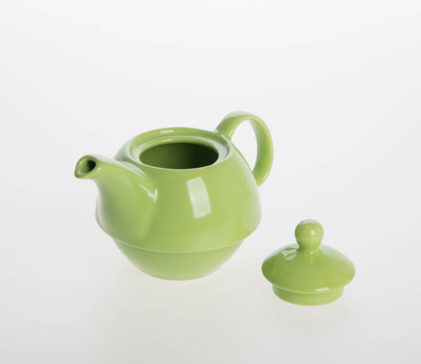 istock Tea pot set or Porcelain tea pot and cup on background 962310968
