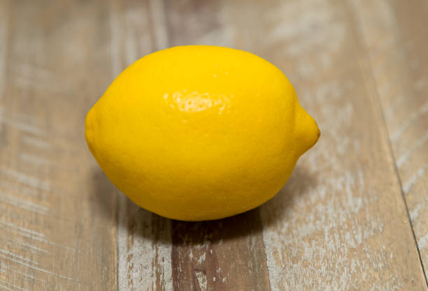 istock fresh lemon on an old vintage wooden table 962311062