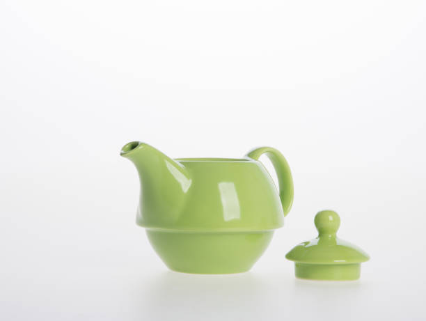 istock Tea pot set or Porcelain tea pot and cup on background 962311670