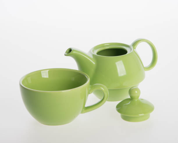 istock Tea pot set or Porcelain tea pot and cup on background 962311674