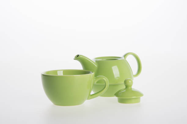 istock Tea pot set or Porcelain tea pot and cup on background 962311680