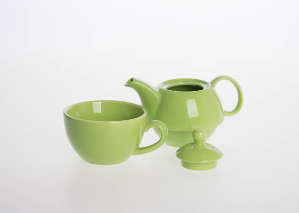 istock Tea pot set or Porcelain tea pot and cup on background 962311736