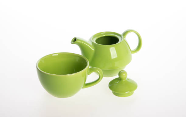 istock Tea pot set or Porcelain tea pot and cup on background 962311744