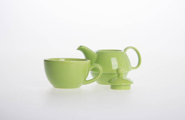 istock Tea pot set or Porcelain tea pot and cup on background 962311748