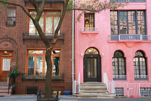 Pink and brown townhouses in the West Village, NYC