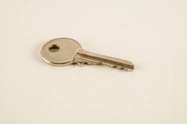 istock Close-up of door lock key 962316272