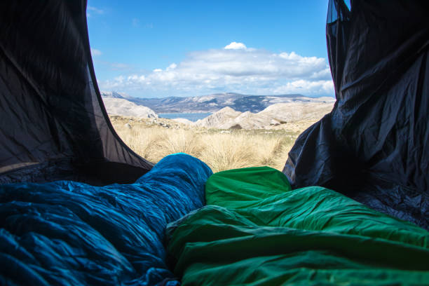 istock Point of view from tent to sea 962316658