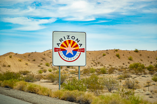 An editorial stock photo of the Arizona State road sign in Arizona, USA.