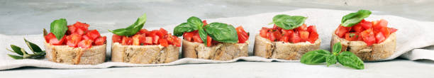 istock fresh tomato bruschetta. italian food appetizer with basil 962323416
