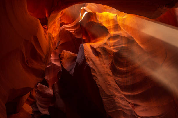 istock Upper Antelope Slot Canyon showing a light beam into the canyon. 962323572