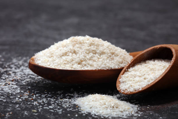 istock Portion of Psyllium Seeds on rustic dark background. Psyllium seed husks 962326092