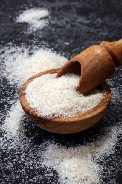 istock Portion of Psyllium Seeds on rustic dark background. Psyllium seed husks 962326142