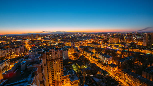 istock Evening cityscape from rooftop. Houses, night lights. Voronezh downtown 962339490