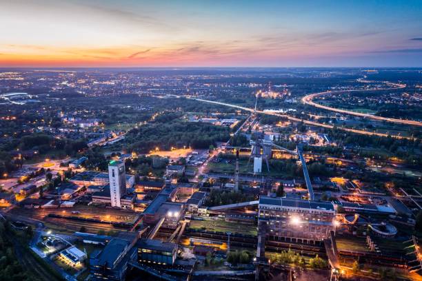 istock Aerial drone view black coal mine at dusk. 962340712