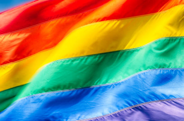 istock Gay Pride Rainbow Flag in Bright Summer Sun 962340812