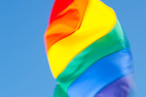 istock Gay Pride Rainbow Flag in Bright Summer Sun 962340906