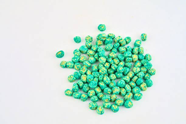 istock Dried pea seeds ready to plant. Close-up on a white background 962344684