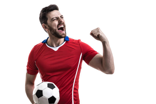istock Fan / Sport Player on red uniform celebrating on white background 962353304