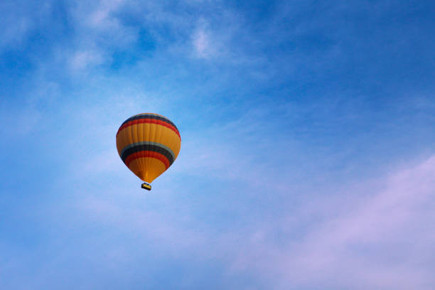 istock Colorful Hot Air Balloons in Flight over blue sky 962371760