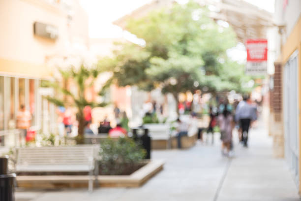 istock Blurred people shopping at outlet in America 962383132