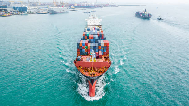 istock Aerial top view container cargo ship, Business import export logistic and transportation of International by container cargo ship in the open sea. 962383576