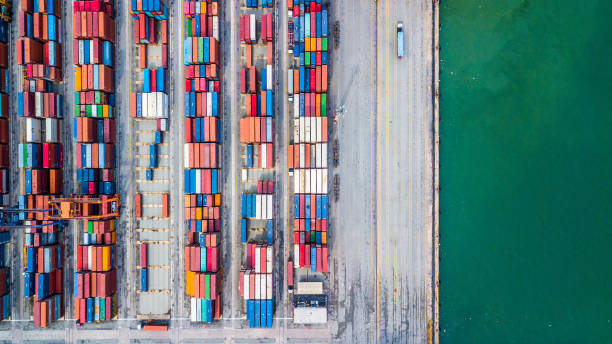 istock Aerial top view stack of freight container in rows, Container in import export business and logistic and transportation. 962383694