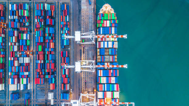 istock Aerial top view container cargo ship, Business import export logistic and transportation of International by container cargo ship in the open sea. 962386018